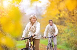 Couple cycling outdoors